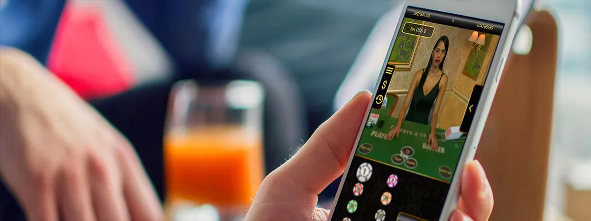 Brazilian gamer engaging with a live roulette wheel via the 9FUN application